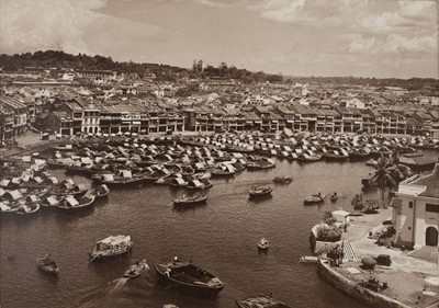 Lot 105 - Singapore. A Singapore river scene with numerous small vessels, c. 1930
