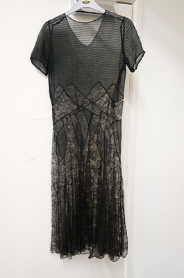 Lot 463 - Clothing. A group of 14 dresses, early 20th century and later