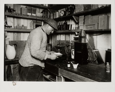 Lot 96 - Ponting (Herbert). Herbert Ponting at work in the darkroom..., gelatin silver prints
