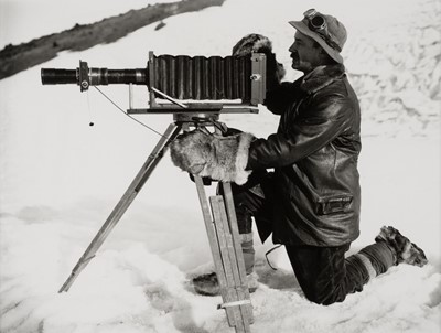 Lot 97 - Ponting (Herbert). Herbert Ponting with telephoto apparatus..., gelatin silver prints