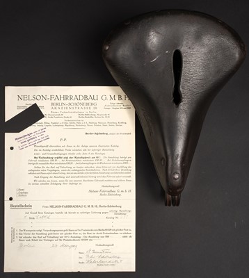 Lot 259 - Einstein’s Bicycle Saddle. A Nelson brown leather saddle + signed order form, 1929
