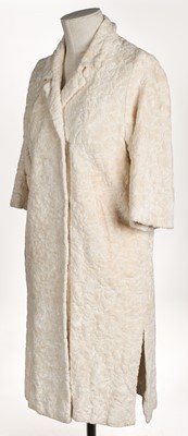 Lot 458 - Clark (Ossie, 1942-1996). A black bouclé coat, & another similar