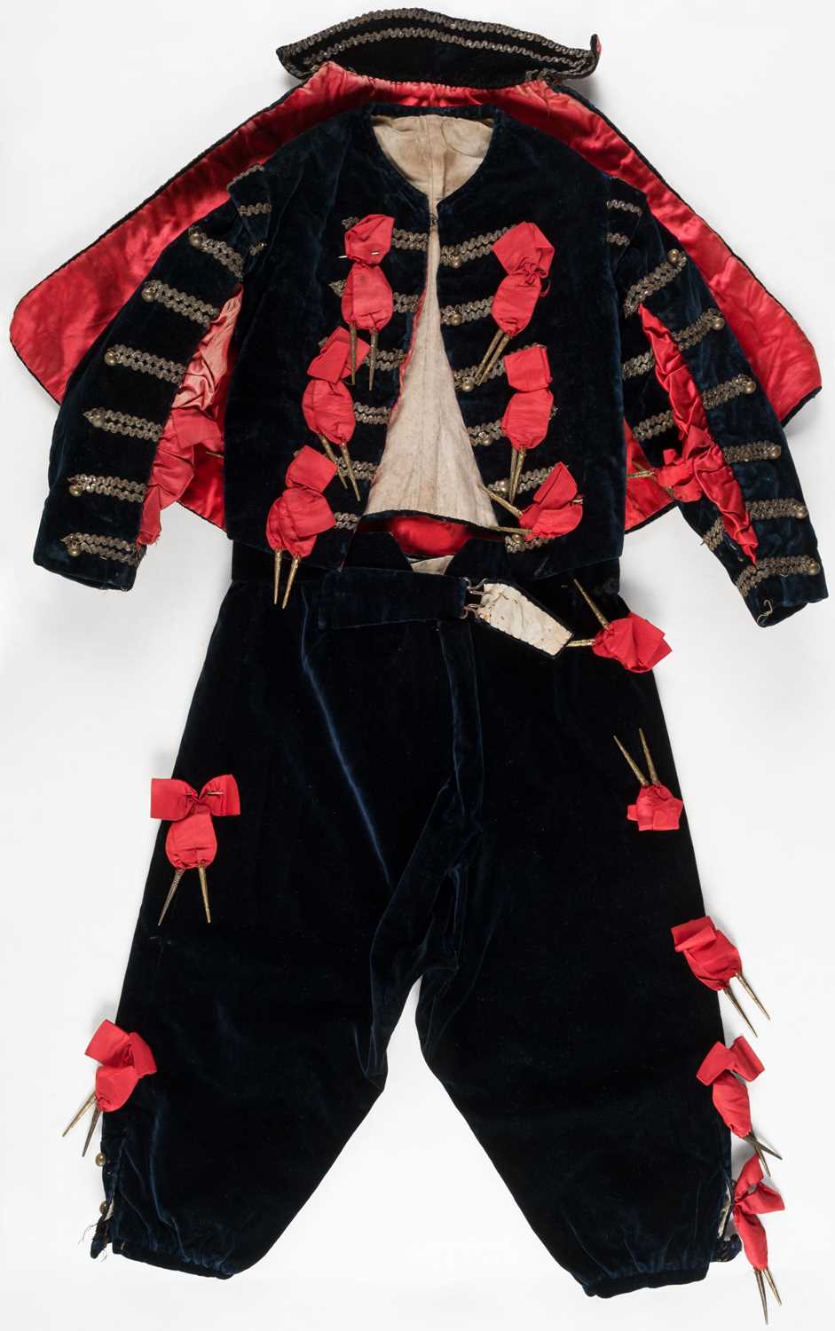 Lot 448 - Children's Clothing. A child's three-piece velvet page boy suit, 19th century