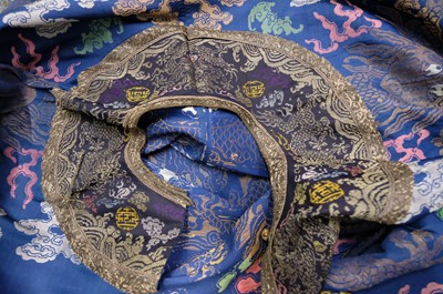 Lot 451 - Chinese Dragon Robe. A silk brocade nine-dragon robe, late Qing Dynasty