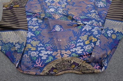Lot 451 - Chinese Dragon Robe. A silk brocade nine-dragon robe, late Qing Dynasty