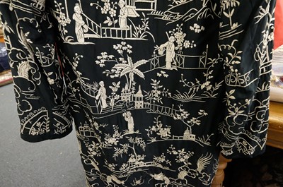 Lot 456 - Chinese. An embroidered coat, early 20th century, & an embroidered jacket and skirt