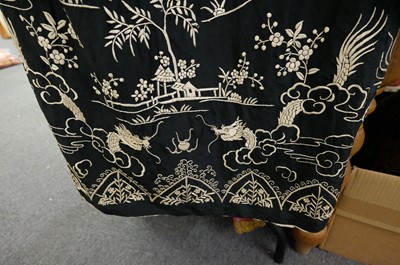 Lot 456 - Chinese. An embroidered coat, early 20th century, & an embroidered jacket and skirt