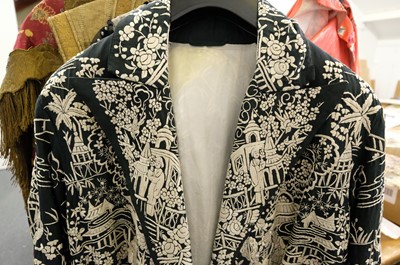 Lot 456 - Chinese. An embroidered coat, early 20th century, & an embroidered jacket and skirt