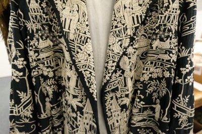 Lot 456 - Chinese. An embroidered coat, early 20th century, & an embroidered jacket and skirt