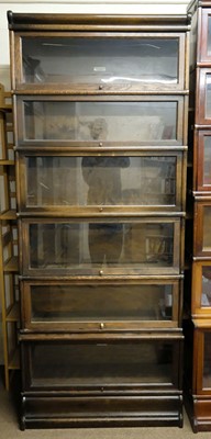 Lot 385 - Bookcase. A 1920s Globe Wernicke oak bookcase