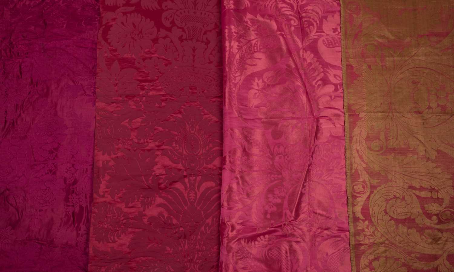 Lot 483 - Fabric. A group of red damask fabric pieces, 18th and 19th century