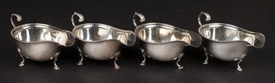 Lot 716 - Sauce boats. A set of 4 silver sauce boats by F.A.F & co, Sheffield, 1928