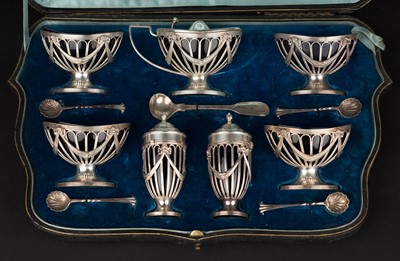Lot 695 - Condiment set. An Edwardian Silver Condiment Set, in fitted case, by Goldsmiths & Silversmiths Co Ltd, London, 1904