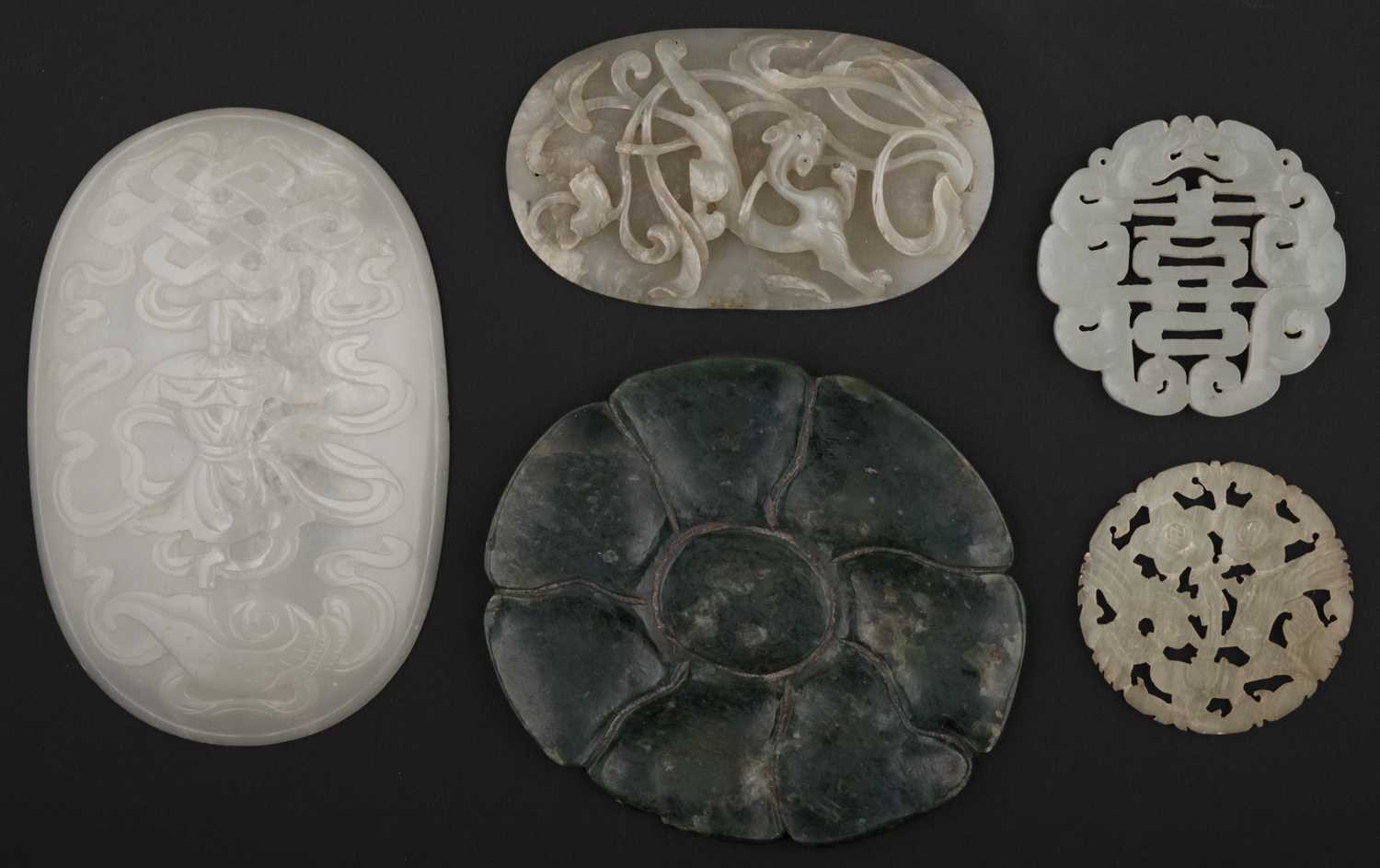 Lot 582 - Jade. A Chinese white jade domed panel,