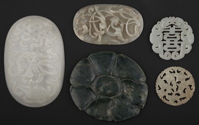 Lot 582 - Jade. A Chinese white jade domed panel, probably from a table box