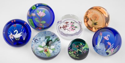 Lot 626 - Paperweights. A collection of Caithness glass paperweights and reference books