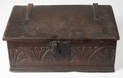 Lot 627 - Bible box. A carved oak bible box, early 18th century