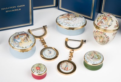 Lot 490 - Halcyon Days Enamel Boxes. A collection of 7 Beatrix Potter enamels