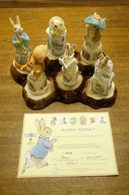 Lot 498 - Royal Worcester. Two Sets of 6 'Golden Edition' Candle Snuffers, 2002