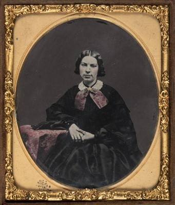 Lot 334 - Sixth-plate tinted ambrotype of a woman