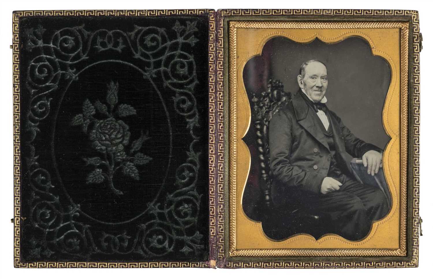 Lot 318 - Quarter-plate tinted portrait of a seated gentleman